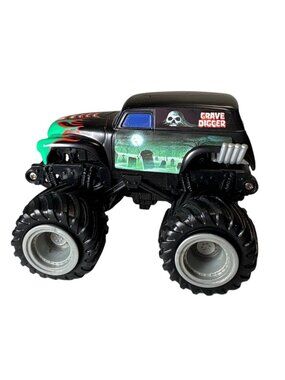Grave Digger Monster Truck Toy With Oversized Tires & Graphic Details 4" x 3"